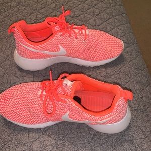 Orange-pink Nike Roshe Runs